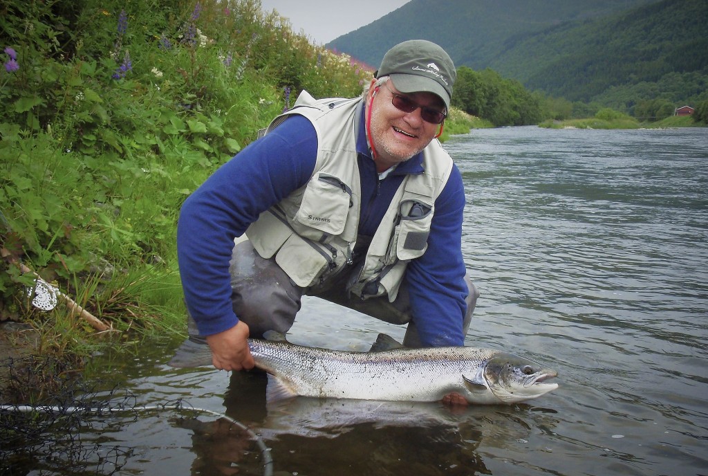 Pär Jansson with bright summer salmon from the Surna River caught on Chernobyl Ant