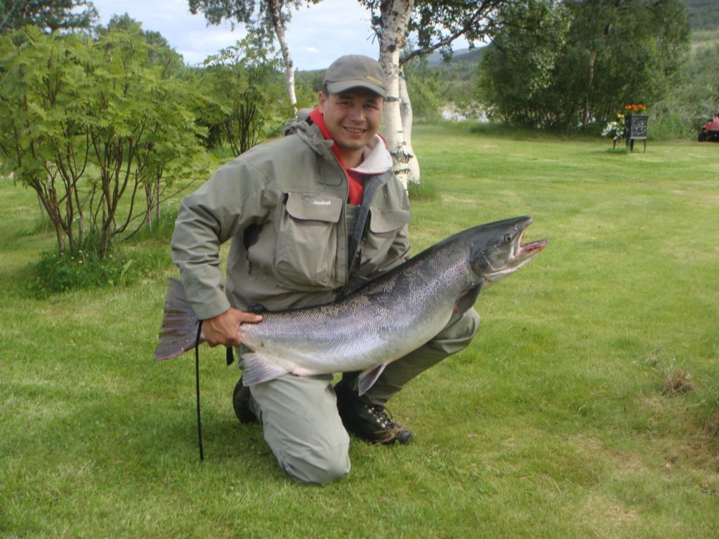 Mr. Joakim Haugen with a 17 kg. + salmon (37,7 lb) caught on a Monster Tube Caddis
