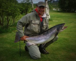 Joakim Haugen with 17,1 kg salmon caught on Monster Tube Caddis in # small